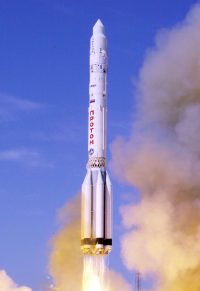 Photo credit; Scott Andrews/NASA Caption; A proton booster lifts off from the Bykanor Cosmodrome carrying the Zvesda, the third element of the International Space Staion Date; 12 July, 2000